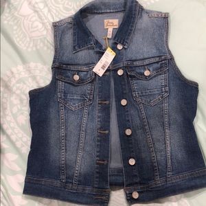 Never worn, brand new denim vest.